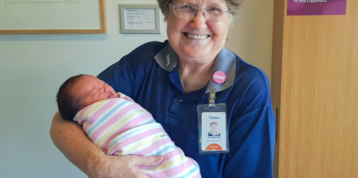 Mater Brisbane volunteer Gwen Grant clocks up 15,000 hours with newborns